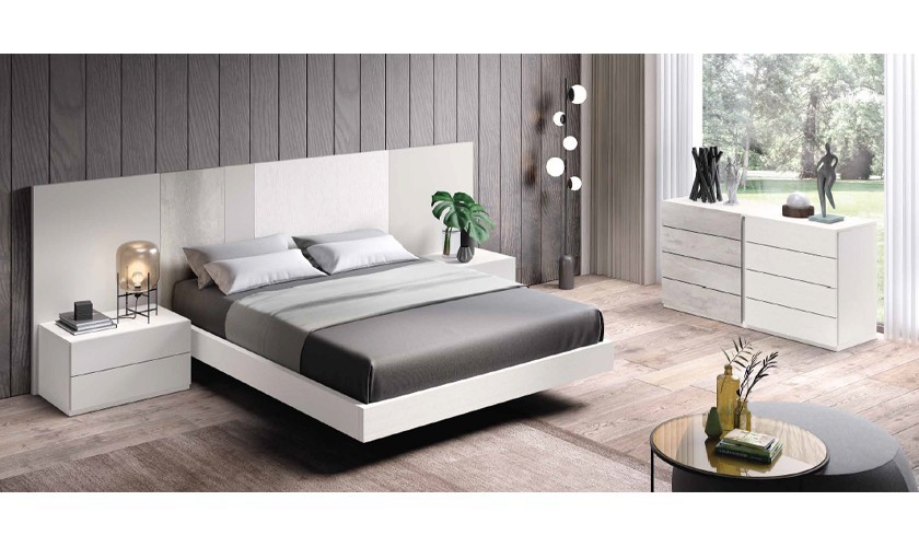 Dormitorio completo compuesto de cabecero, canapé y dos cómodas en madera blanca con acabados en varios tonos